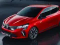 Röd Mitsubishi Colt, en modern elbil. Inga problem här, bara snygg design och framtidens körning.
