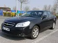 Black Chevrolet Epica sedan parked in a lot, front view.