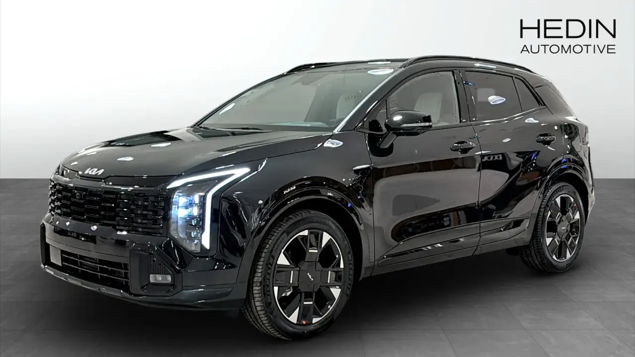 Svart Kia Sportage Plug-in Hybrid redo för testkörning. En modern SUV med distinkt design.