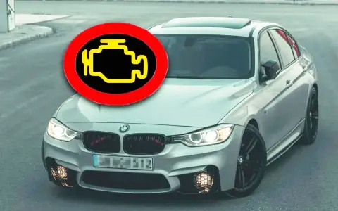 Motorlampan lyser, bilen går ryckigt. En BMW med motorlampan tänd och en varningstriangel som indikerar problem.