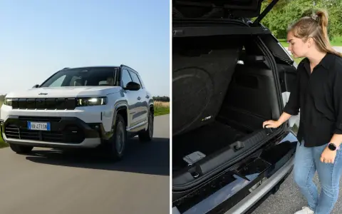 Vit Jeep Compass kör på en väg, en kvinna inspekterar bagageutrymmet. En del av en jeep compass test.