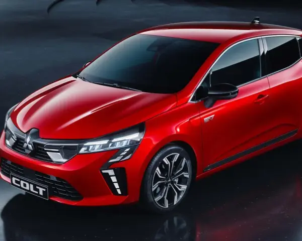 Röd Mitsubishi Colt, en modern elbil. Inga problem här, bara snygg design och framtidens körning.
