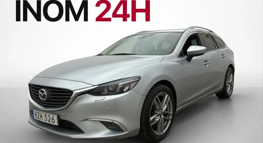 Silver Mazda 6 kombi, hemleverans inom 24h. Inga problem med denna bil!