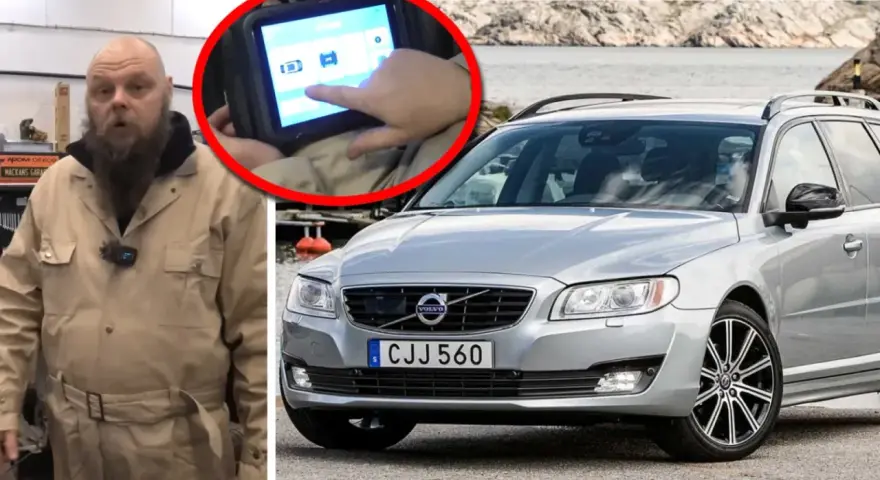 Mekaniker kollar felkoder på en Volvo V70 med en diagnosdator.